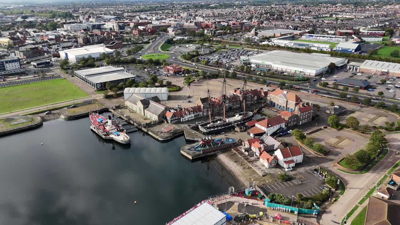 Aerial drone video Hartlepool marina harbour port beach coastal town County Durham North East England UK HMS Trincomalee