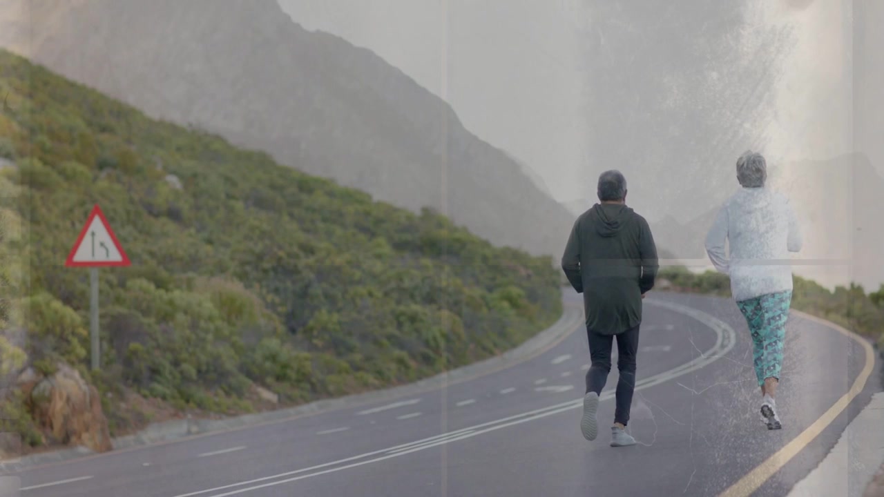 Senior couple starting run for health, camera tracking winding road while film scratches overlaying