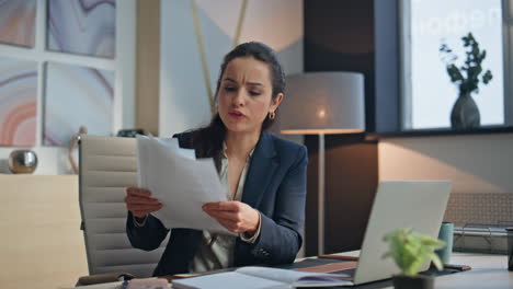 Businesswoman arguing video conference displeased failed business deal closeup