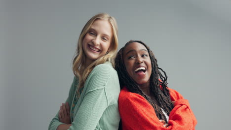 two women laughing together