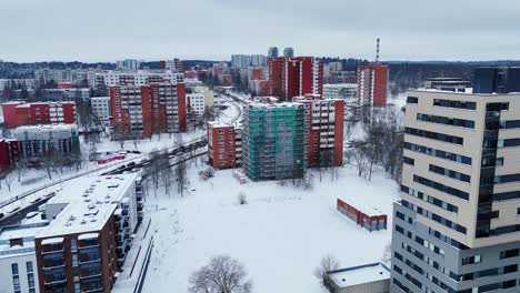 Modern-apartment-condo-building-surrounded-by-metal-scaffolding-during-renovations-in-Vilnius-Lithuania