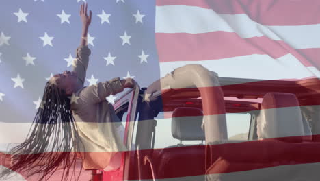 Animation-of-flag-of-usa-over-african-american-woman-in-car-on-beach