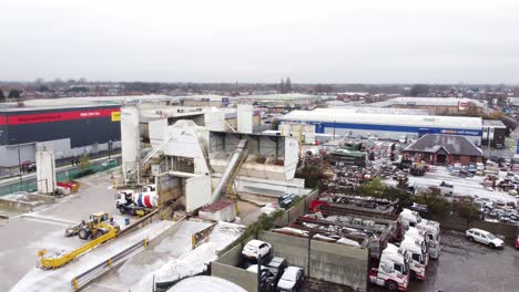 Industrial-CEMEX-concrete-manufacturing-factory-yard-aerial-view-with-trucks-parked-around-equipment