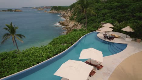 Breathtaking-aerial-of-mesmerizing-coastline-in-Huatulco,-Mexico