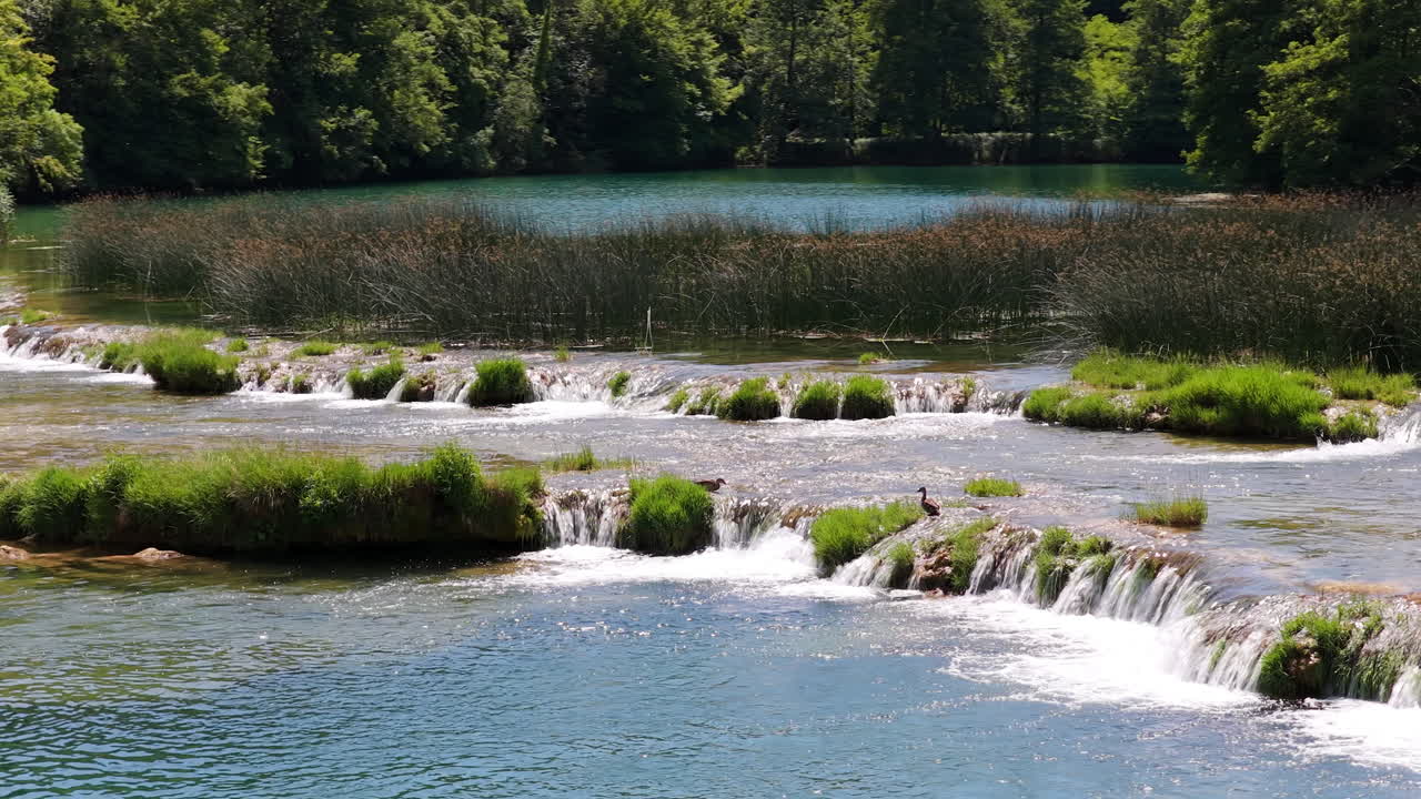 The Mreznica Karst River With Waterfalls In Croatia. Aerial Shot