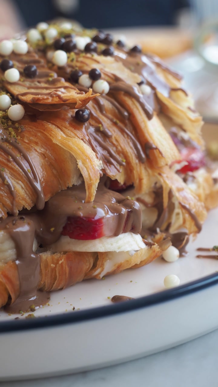 Gourmet Croissant Topped with Chocolate, Strawberries, and Bananas
