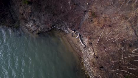 Drone-View-of-Man-Fishing-in-a-Lake