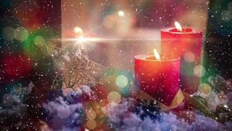 Candles-and-christmas-decoration-outside-a-window-combined-with-falling-snow