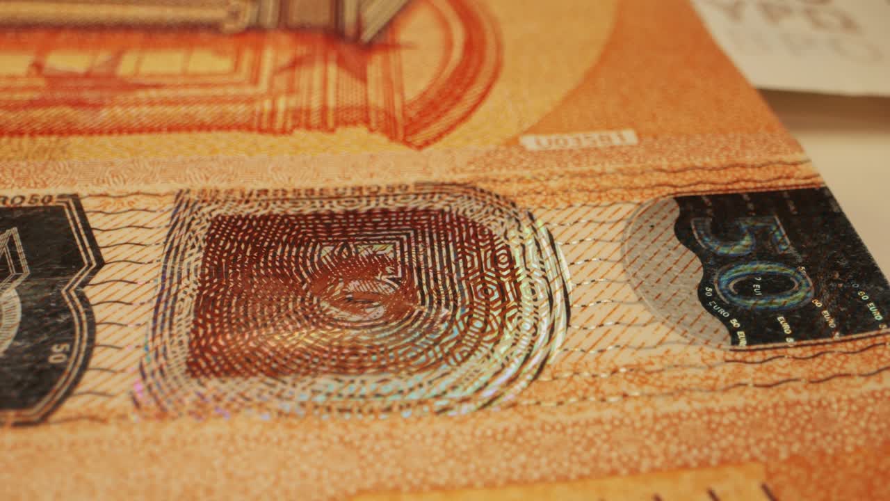 Fifty euro banknotes close-up. European currency EUR, EU Central Bank. 50 euro money macro. Economy, financial and banking concept in European union.