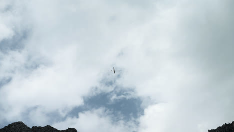 Glider-Plane-Flying-Above-the-Austrian-Alps,-Europe