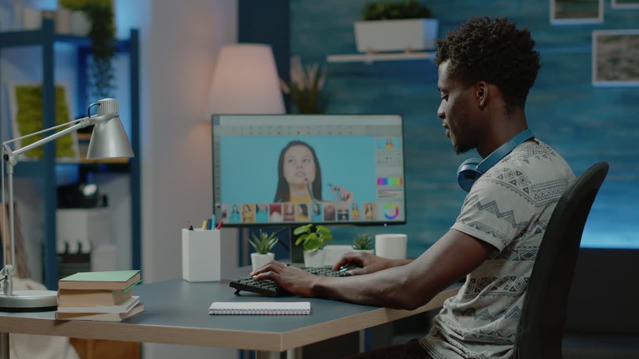 Illustrator doing retouch work on photos using editing app