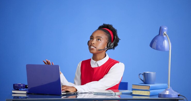 Young Woman Working as Customer Support Representative on Laptop