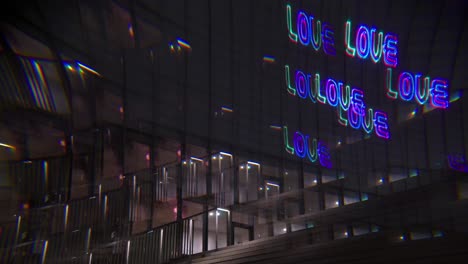 inspiring trippy messages of peace, love, and unity projected onto an art exhibition wall through a captivating laser show