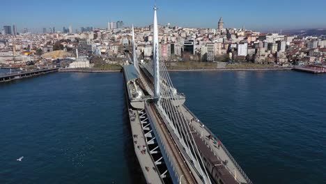 aerial view stock video europe, golden horn-istanbul, istanbul, turkey-middle east, 4k resolution on the center of istanbul, city with train in bridge and car interchange traffic