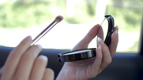 Latin-Woman-Putting-On-Her-Makeup-In-Car-While-Driving-On-A-Highway-In-Mexico