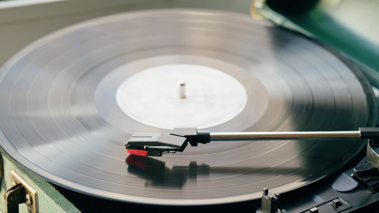 Close-up of a Vinyl Record Spinning on a Turntable