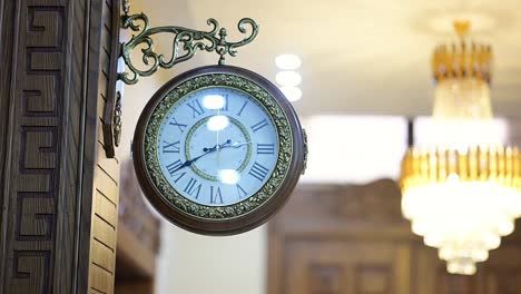 clock hanging on the wall in house