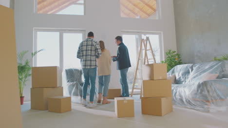 housing agent showing new apartment