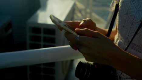 woman using mobile phone while travelling in ferry 4k