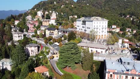 Brunate-township-on-top-of-mountain-in-Italy,-aerial-view