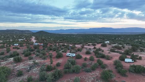 campervans and rv's parked at dispersed campground in sedona, arizona, usa