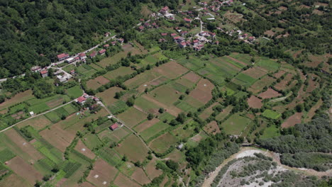 Aerial-drone-view-of-old-village-in-a-valley