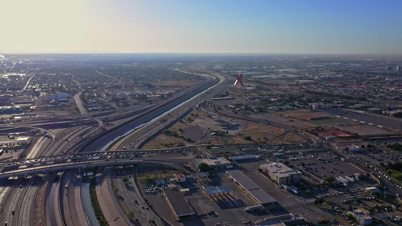 Juarez City X monument. Flying over Border Wall and Cesar E. Chavez Border Highway (375) in El Paso, TX before Title 42 Ends. 4k Drone Footage. Av. Rafael Pérez Serna Highway in Ciudad Juárez, Mexico.