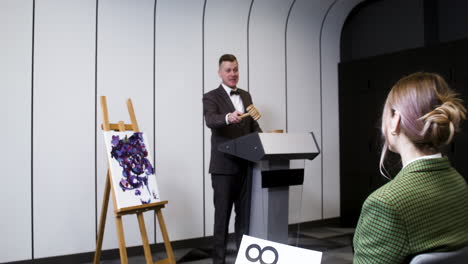 man in elegant suit with gavel