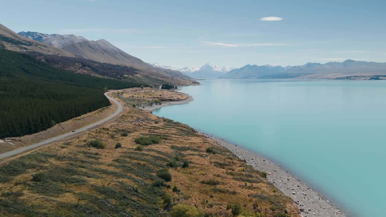 Aerial View of Turquoise Lake with Mountains in New Zealand