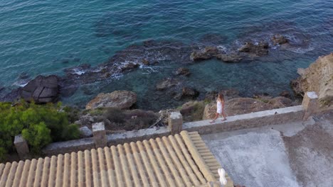 woman carelessly stepping over the cliff edge