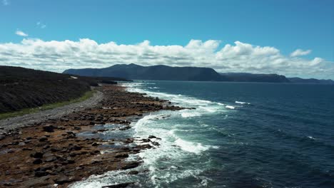 Shoreline-in-Gros-Morne-National-Park,-Newfoundland,-Car-Driving-Along-the-Shore