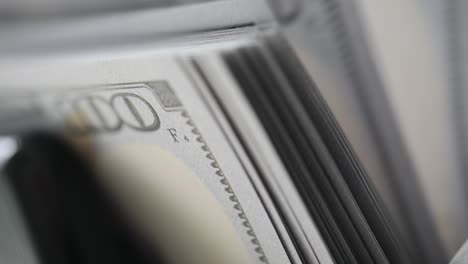 close-up of stack of us 100 dollar bills