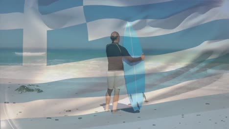 Animation-of-flag-of-greece-over-caucasian-man-with-surfboard-on-beach