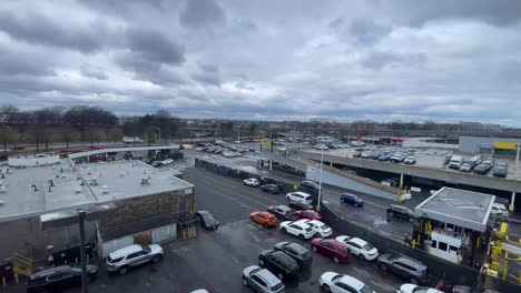 slow-motion-shot-of-a-car-rental-place-inside-new-york-jfk-airport-in-a-cloudy-day