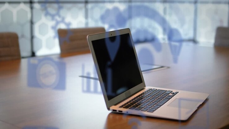 Animation von Icons über Laptop auf Schreibtisch