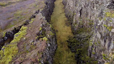 crack between tectonic plates in thingvellir national park in iceland