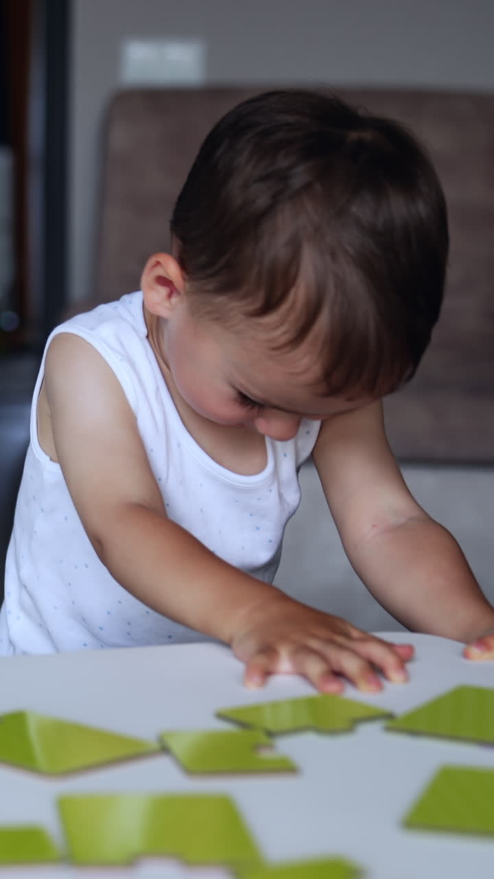Baby Playing with Puzzles
