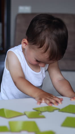 baby playing with puzzles