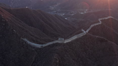 aerial shot of the great wall of china at sunset