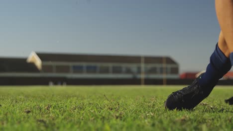 Young-adult-female-rugby-player-on-a-rugby-pitch