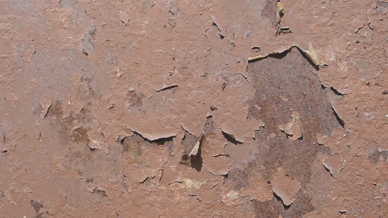 Primo piano di una superficie metallica arrugginita
