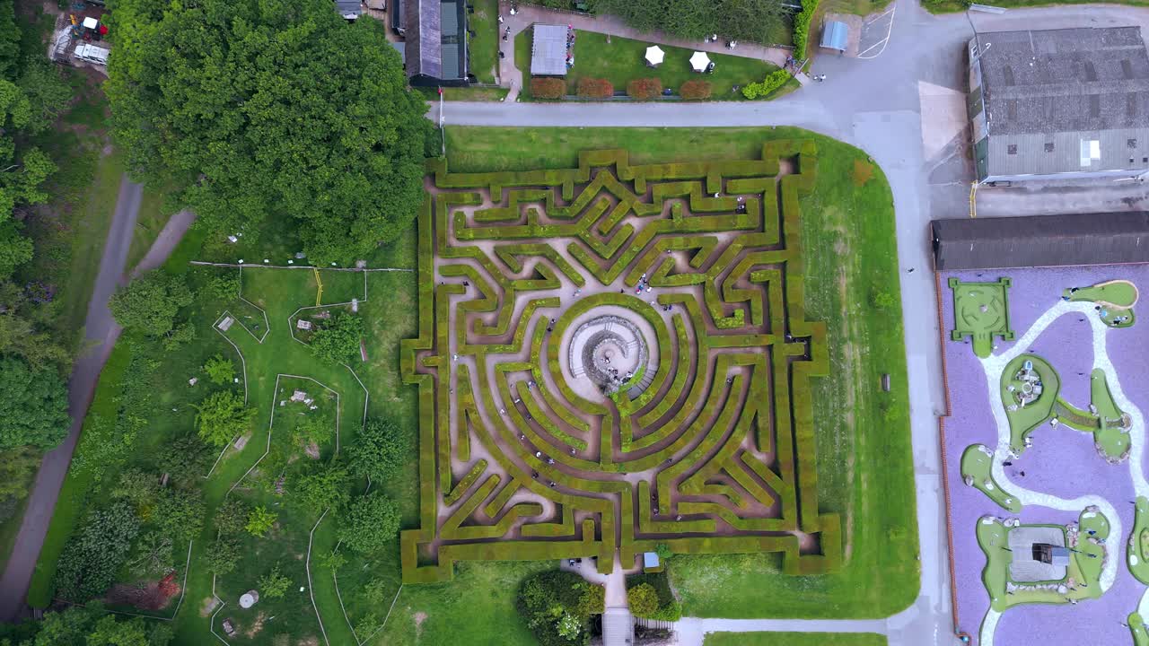 Sightseeing puzzle attraction, exploring castle gardens, aerial view