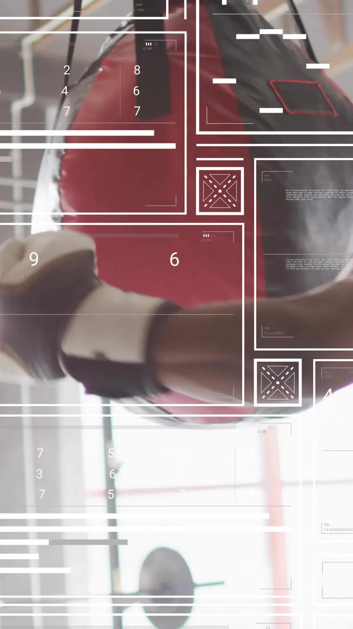 Vertical video: Male boxer starting jabs and crosses on bag in gym, training, HUD tracking strikes