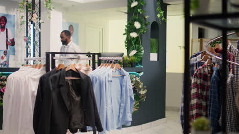 employee in clothing shop sorting orders