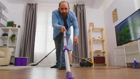 low angle mopping the floor