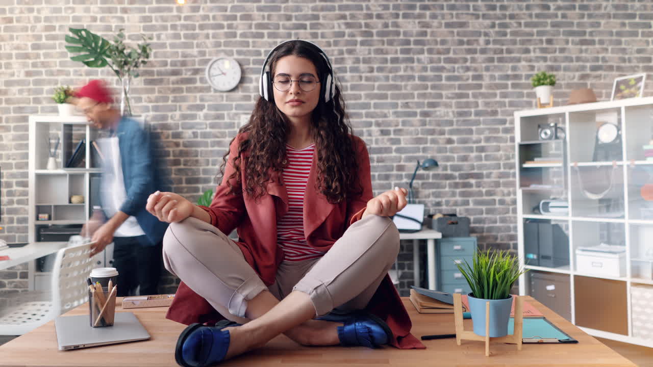 Woman meditating in the office