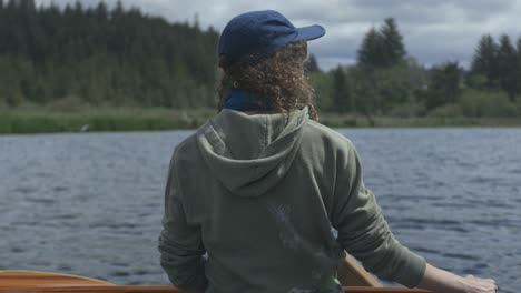 Back of a person on a canoe in Beaver Creek, Brian Booth State Park, Oregon coast