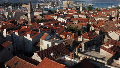 Old-Town-Of-Trogir-In-Dalmatia,-Croatia-During-Summer---aerial-drone-shot