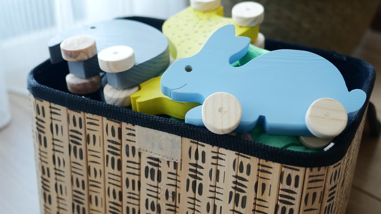 Wooden toys in a basket