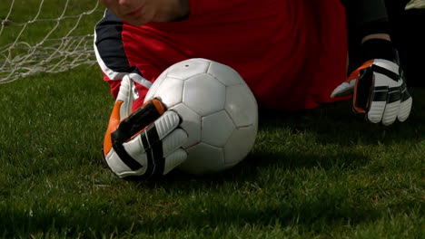 Goalkeeper-in-red-making-a-save